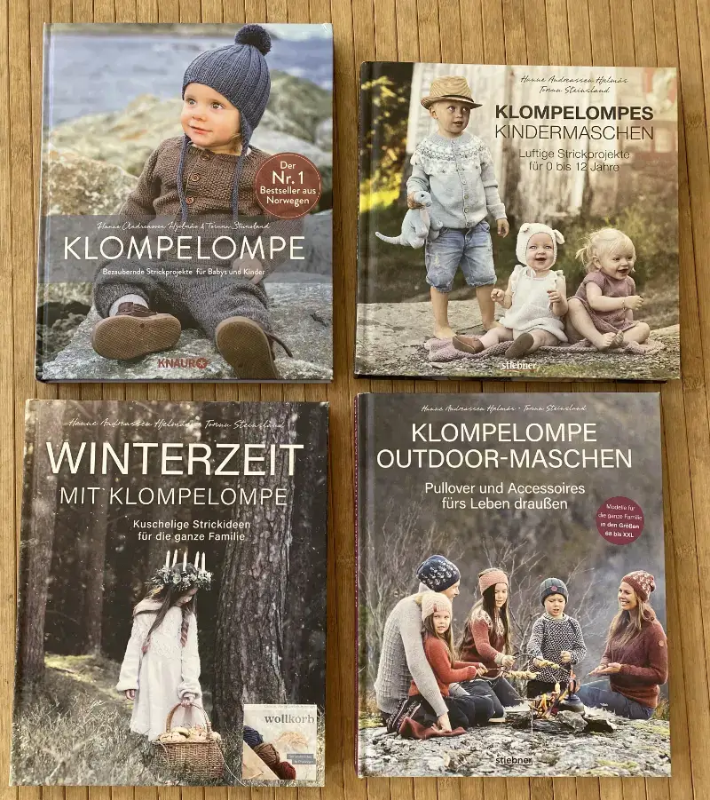 Die Titelbilder der vier Klompelompe Strickbücher: "Klompelompe", "Klompelompes Kindermaschen", "Winterzeit mit Klompelompe" und "Klompelompe Outdoor-Maschen"